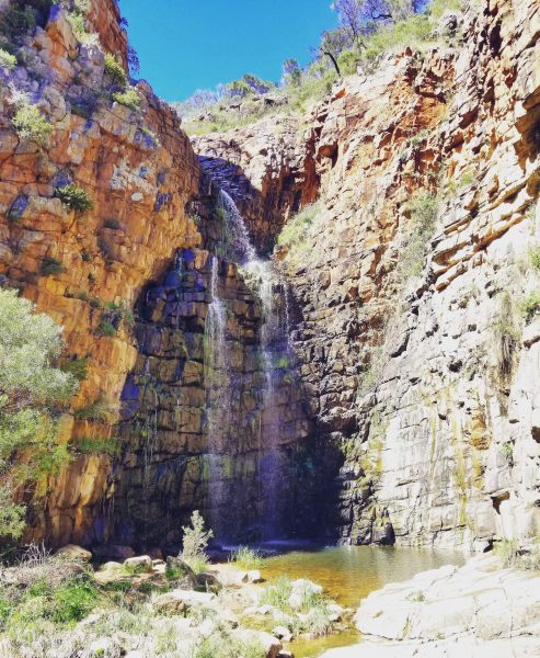 A waterfall against rockface in Morialta Conservation Park, Australia