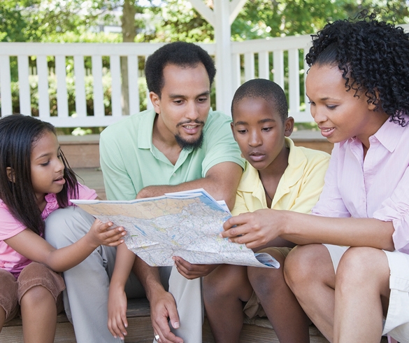 Family looking at a map - 12786