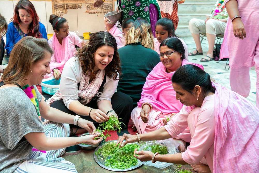 women gathered together and laughing - Purposeful Nomad travel to India